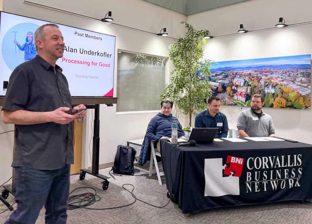 A speaker addresses a crowd at a Corvallis Business Network meeting.